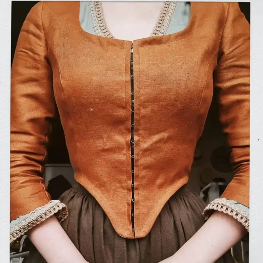 Claire Fraser Outlander Corset mustard bodice with hooks, linen brown skirt, soft mint blouse with lace and green apron with leaves cord. Handmade natural sustainability linen clothes.