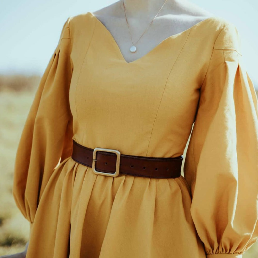 Handmade vintage style mustard linen dress with V neckline, twirl skirt and puff sleeves.