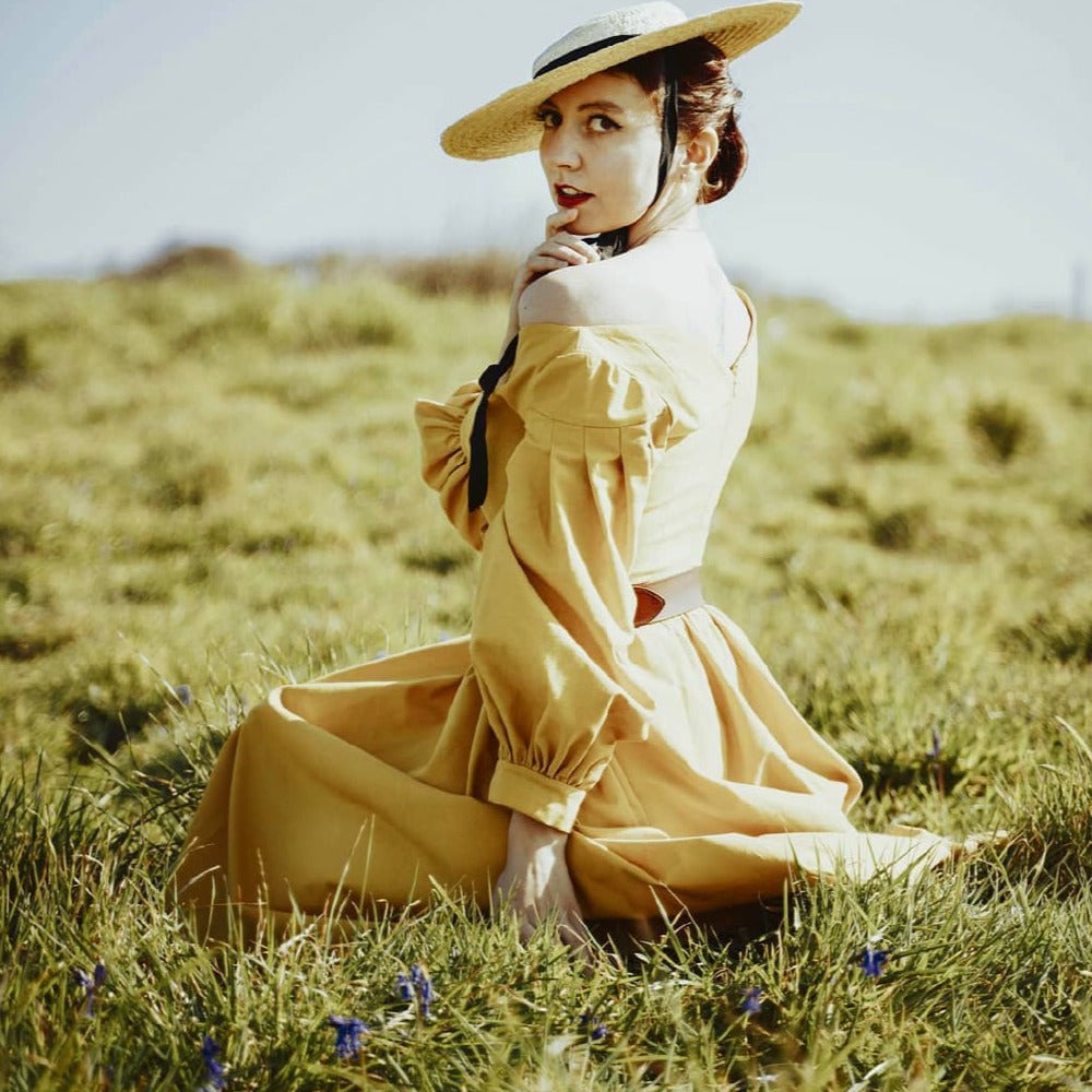 Handmade vintage style mustard linen dress with V neckline, twirl skirt and puff sleeves.