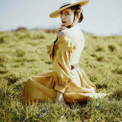 Handmade vintage style mustard linen dress with V neckline, twirl skirt and puff sleeves.