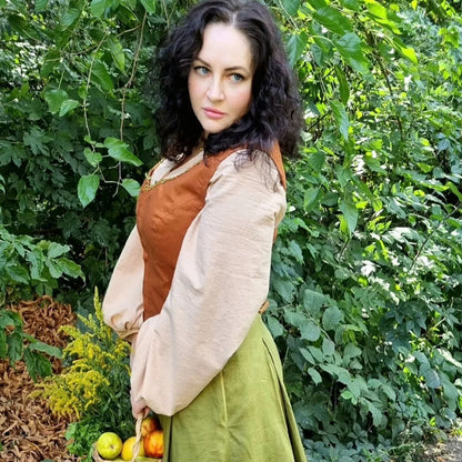 Rosie Cotton goblincore Shire costume. Handmade natural sustainability linen clothes: rust linen corset vest with leaves, olive twirl skirt and beige pirat blouse.